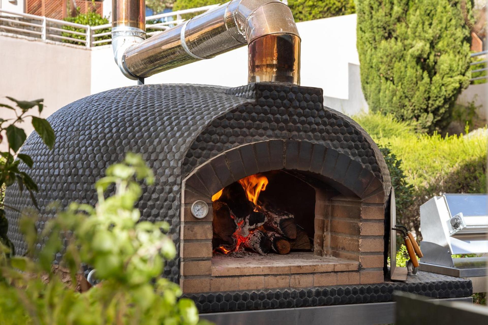 Grande Real Santa Eulalia Resort & Hotel Spa Albufeira Exterior photo Wood-fired oven