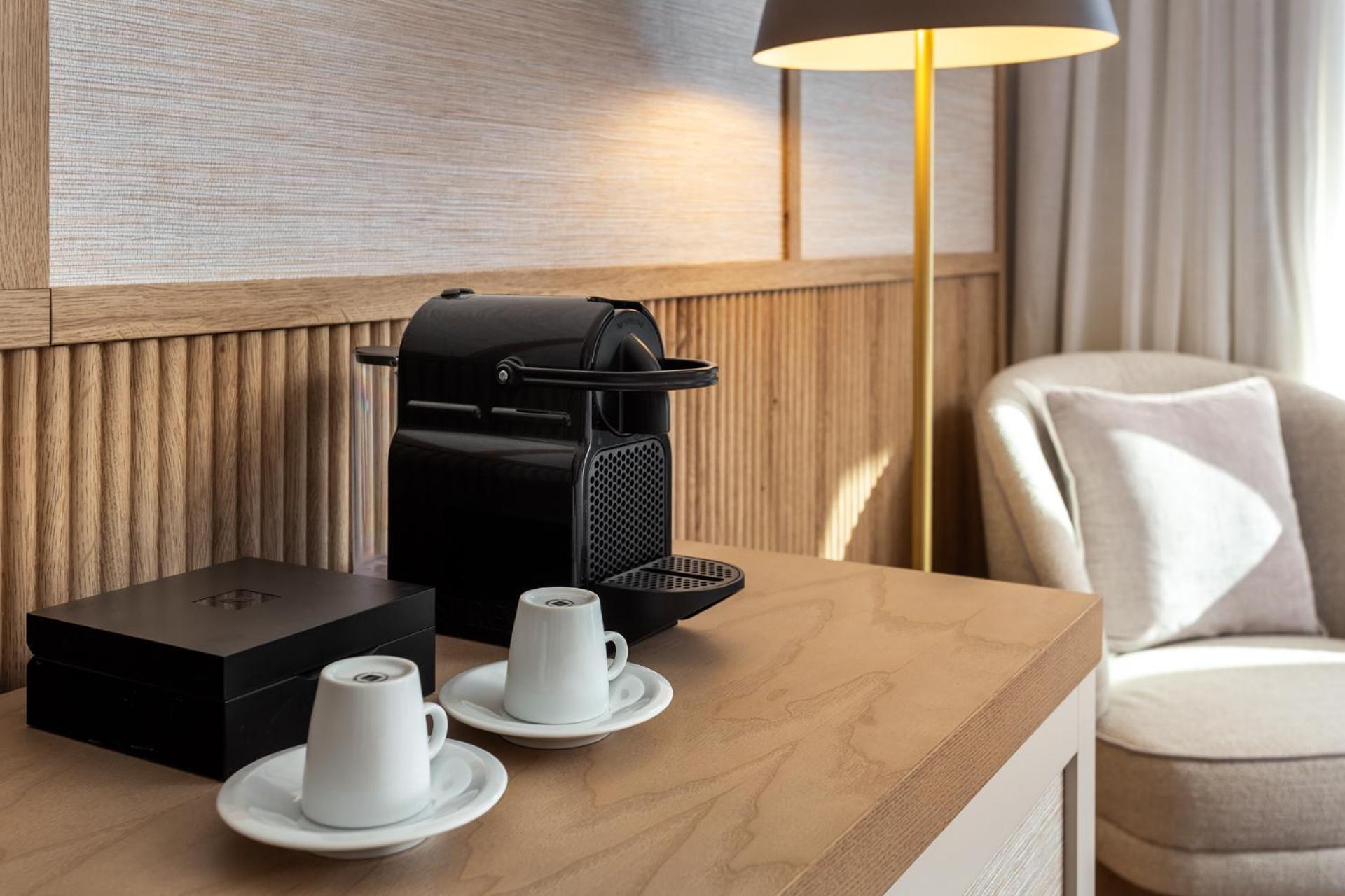 Grande Real Santa Eulalia Resort & Hotel Spa Albufeira Exterior photo A Nespresso coffee machine in a hotel room